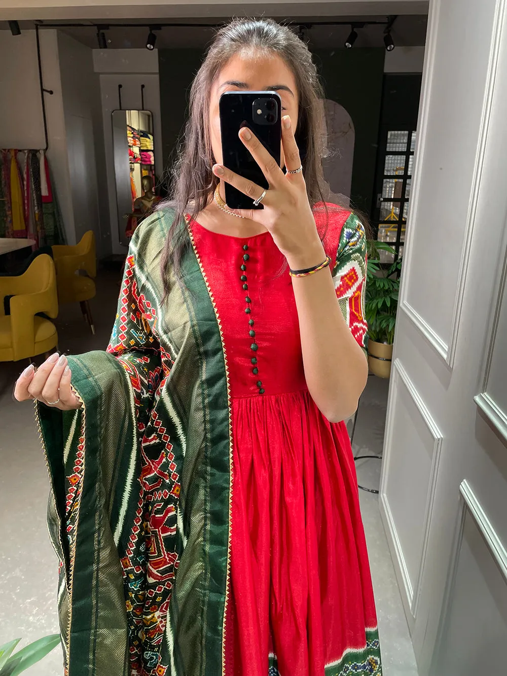 Red Color Patola And Foil Printed Dola Silk Gown